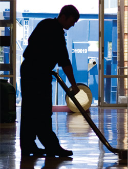 man cleaning floor