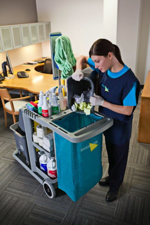 Janitor with cleaning supplies